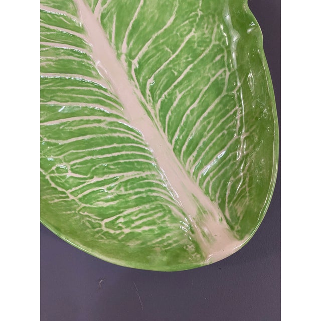 This is a single piece of "Lettuce Ware" created by the legendary Palm Beach ceramicist Dodie Thayer (1926–2018). This...