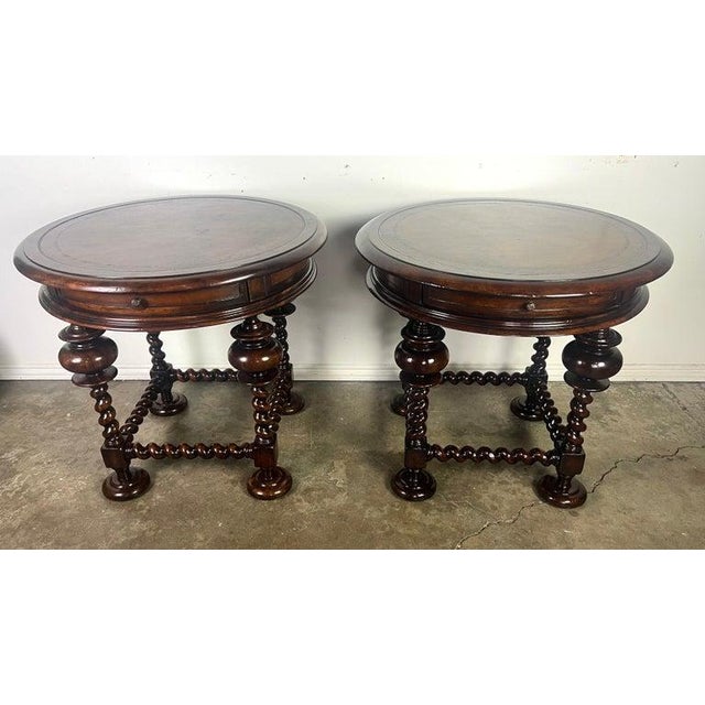 Pair of elegant round accent tables from John Richard, known for their high quality craftsmanship and luxurious designs....