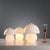Set of table lamps with a charming mushroom shape, made of white and transparent Murano glass. This piece is attributed to...