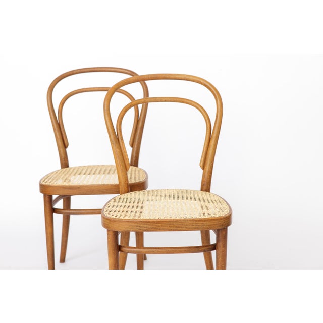 Pair of Vintage Thonet Model 14 Chairs by Radomsko, Poland, 1980s A beautiful pair of vintage bentwood chairs manufactured...
