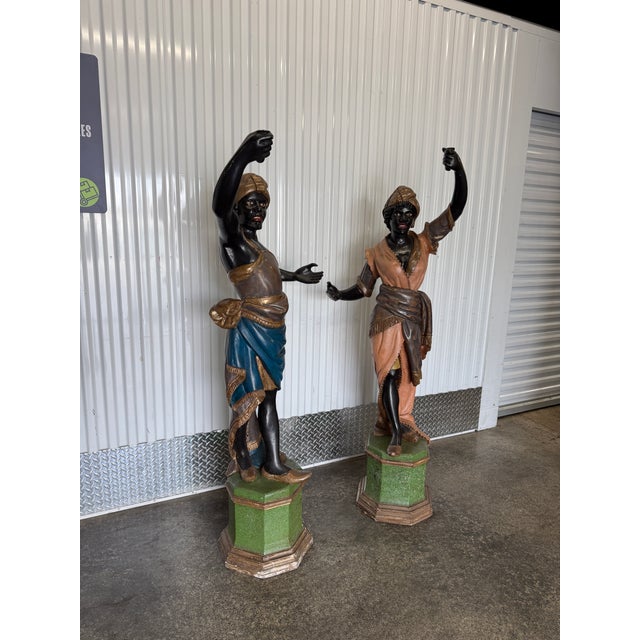 Lifesize Italian Hand Carved Pokychromed Blackamoors dating from the turn of the 20th c missing their lamps sold as found...