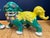 These playful foo dogs will certainly add color and charm to your home. They are so bright and cheerful! Predominately...