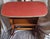 Mid-Century Side Table with Integrated Newspaper Rack in Brown Beechwood with Red Faux Leather Top, 1960s, in Very Good...
