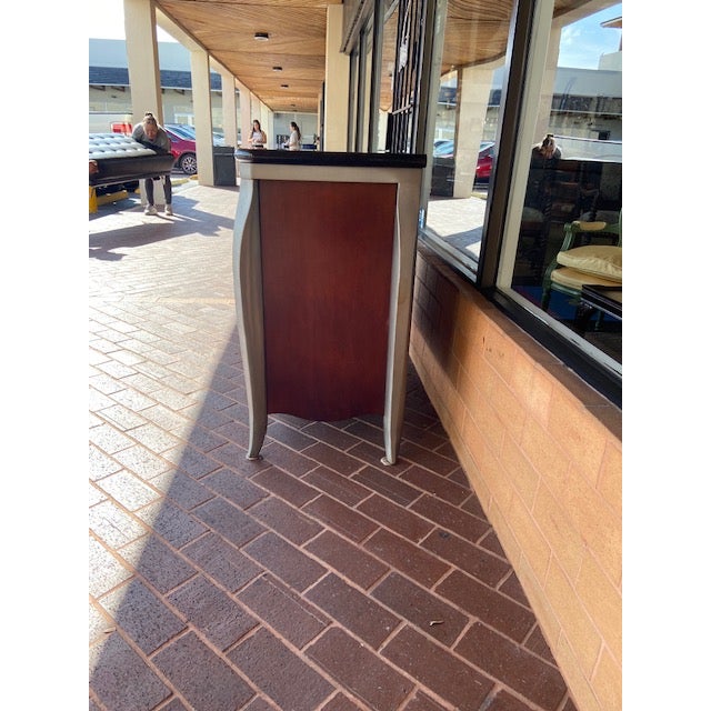 The Bernhardt credenza is a stunning piece of furniture that combines classic design with modern elements. With its...