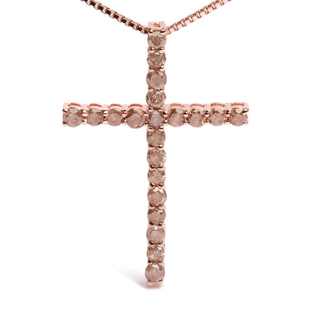Embrace your spirituality with this sparkling 14kt rose gold plated 925 sterling silver cross necklace. This pendant is...