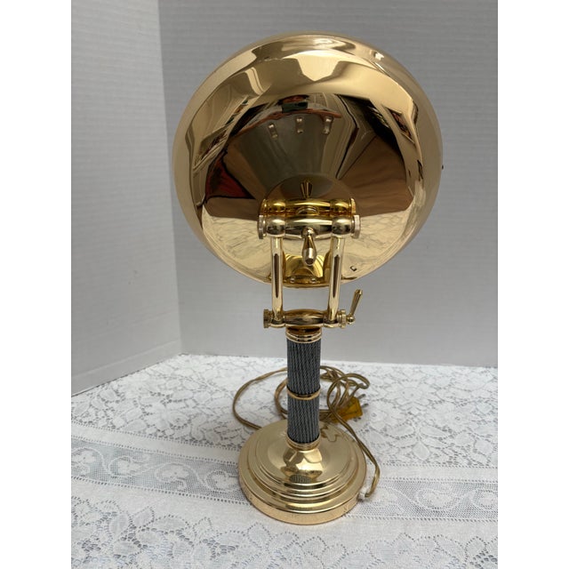 Vintage large brass and braided steel lighted halo magnifying mirror. Classic substantial design and functional for any...