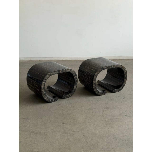 W24 D18 H18 Originally finished in gold leaf, these vintage scroll tables have been fully reimagined with a dramatic dark...