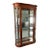 This Pulaski cherry bow front curio cabinet features gracefully curved glass sides and doors that create a panoramic...