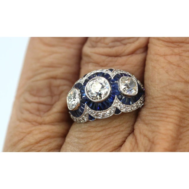 This is part of Chairish’s Fine Jewelry assortment. Art Deco Platinum Sapphire Diamond Ring This Diamond Sapphire ring is...