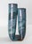 We are selling this pretty turquoise and teal glazed double mouthed vas.e This Mid-Century art pottery vase has nice...