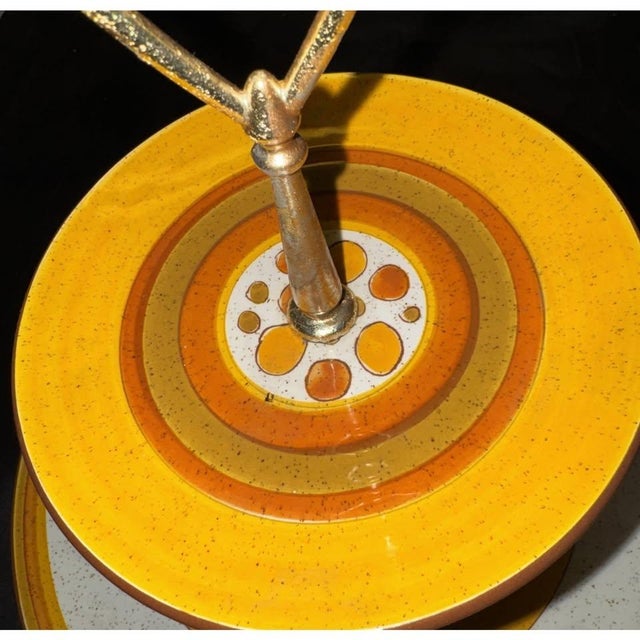 The Stangl Pottery Sun Pebbles 2 Tier Tidbit Serving Tray Plate is a vintage piece of decorative cookware from 1965,...