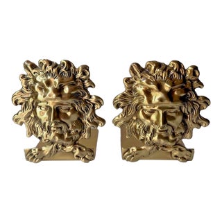 Vintage Bookends Feature a Classic Golden-Brass Finish With a Deeply Detailed Mythological Male Face and Flowing Mane. For Sale
