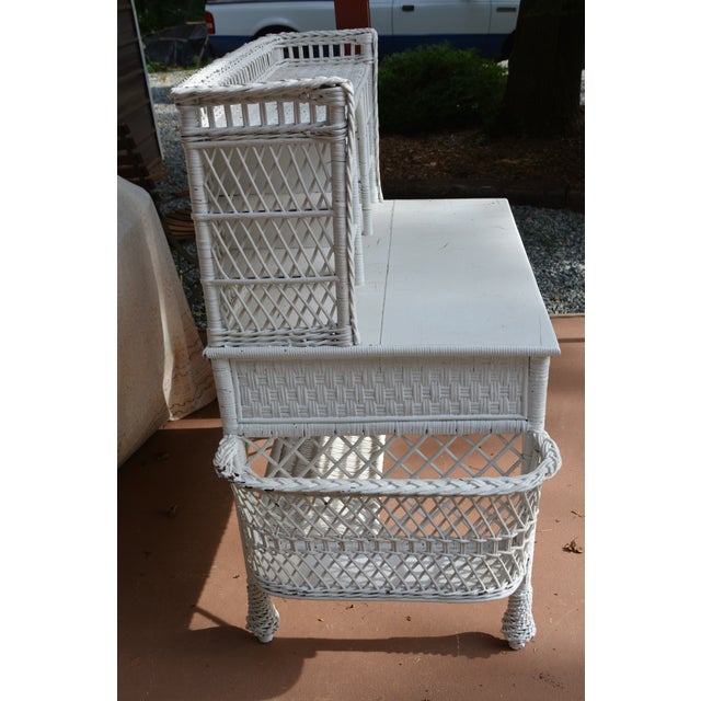 What a great looking wicker desk! Possibly painted as brown is visible in areas. All one piece. Writing area feels like...