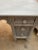 Exquisite antique English style desk or vanity table , chalky light gray patina finish. Opening for the chair is 18” wide.