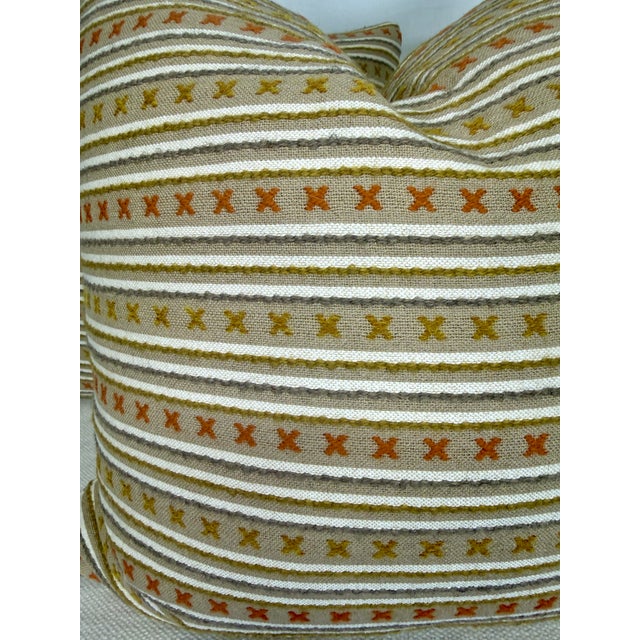 Custom pair of 22" pillows covered in Christopher Farr Cloth "Criss Cross Woven" in natural. These pillows have tapered...