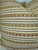Custom pair of 22" pillows covered in Christopher Farr Cloth "Criss Cross Woven" in natural. These pillows have tapered...