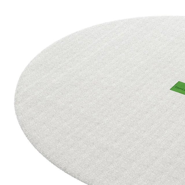 Tapis Retro #026 is a retro rug with a round shape and a neutral color. Inspired by architectural lines, this geometric...
