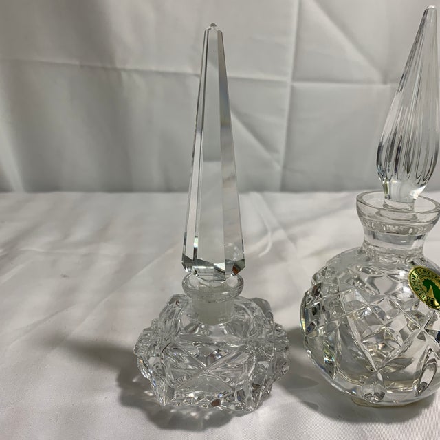 Elevate a luxury vanity or dressing table with this striking pair of vintage cut-crystal perfume boudoir bottles. Both...