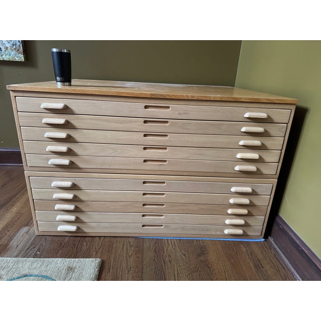 Stackable set of four flat file cabinets. Each cabinet contains five drawers each with an internal storage size of...
