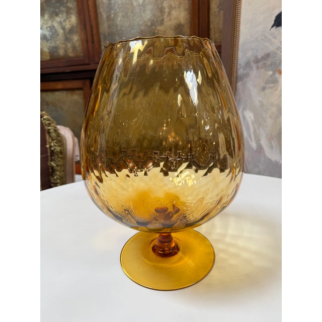 Design Plus Gallery presents an Amber Glass Vase from Empoli. The vase has an art deco with regency style from the Mid...