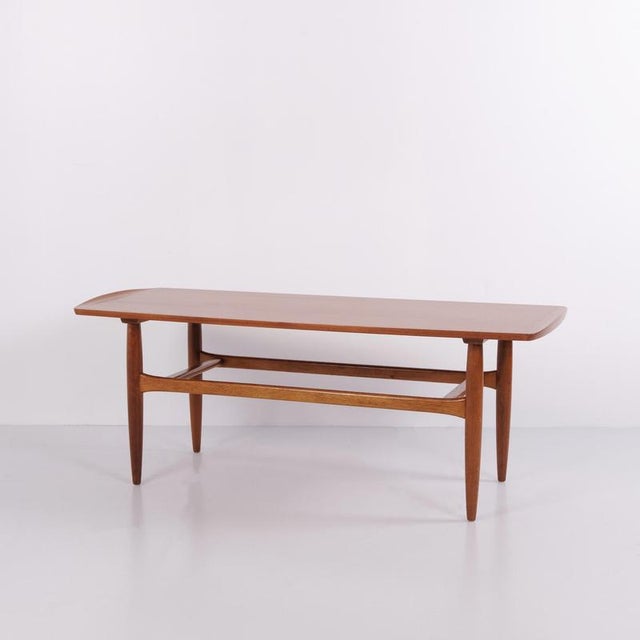 Coffee table crafted from teak and manufactured by jason møbler in the 1960s. The table is an example of danish furniture...