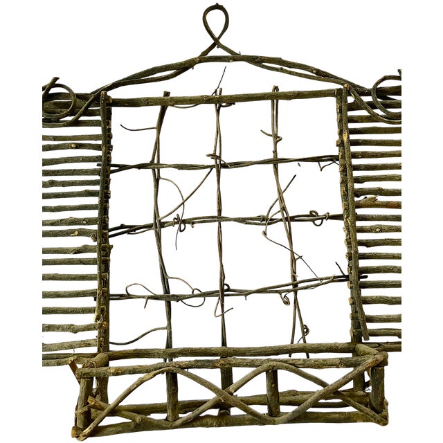 A wonderfully sculptural handmade willow wall pocket crafted in the spirit of French country garden antiques and...