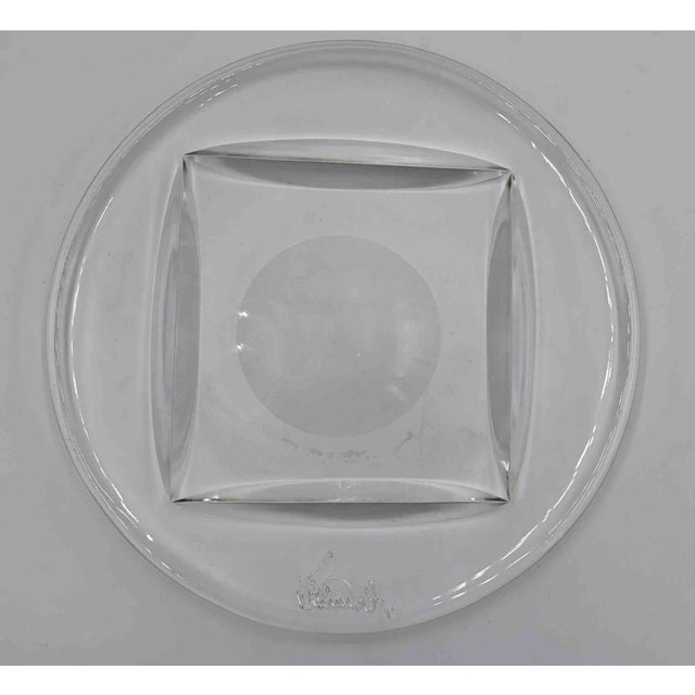 Crystal centerpiece is a decorative object realized in the 1970s. A very elegant centerpiece in transparent crystal,...