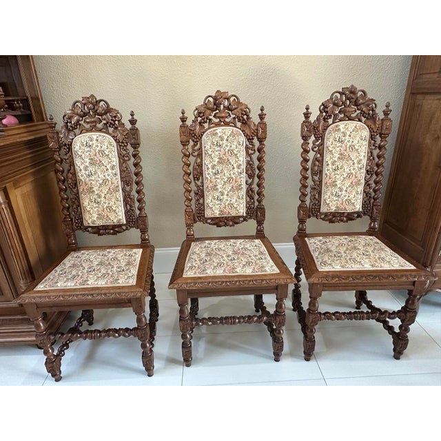A documented matched set of six French carved oak chairs in the Louis XIII hunting style, circa 1860, accompanied by the...