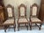 A documented matched set of six French carved oak chairs in the Louis XIII hunting style, circa 1860, accompanied by the...