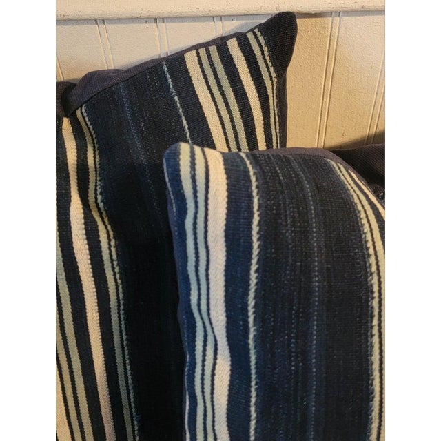 Fantastic Indigo blue & light blue striped 19thc linen pillows.The backings are in a cotton linen fabric.Inserts are down...
