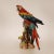 Art Deco tall Italian animal Figurine Ceramic Parrot Macaw on a tree trunk Material: porcelain, ceramic, tin glazed...