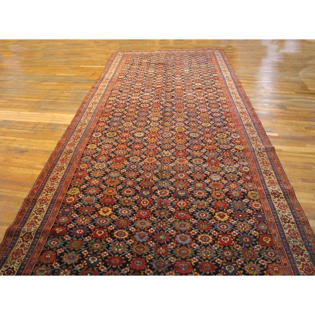 19th Century N.W. Persian Gallery Carpet ( 6'6" x 19' - 198 x 579 ) This rug has an all-over linear jewel toned floral...