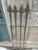 Set of 4 antique fence posts with substantial fleur-de-lis type finials used as plant supports or garden or interior...
