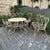 Mid-Century French Wrought Iron 6-Piece Garden Salon Set is a charming way to furnish your outdoor space! The cafe table...