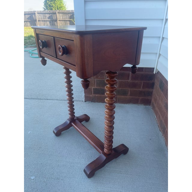 This charming mid-20th-centure spool (bobbin-turned) side table was manufactured by the Cavalier Corporation (also known...