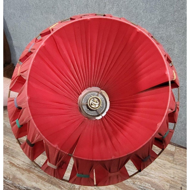 Art deco style servant's floor lamp, circa 1940-1950, in stained wood. the stem is adorned with two shelves. circular...