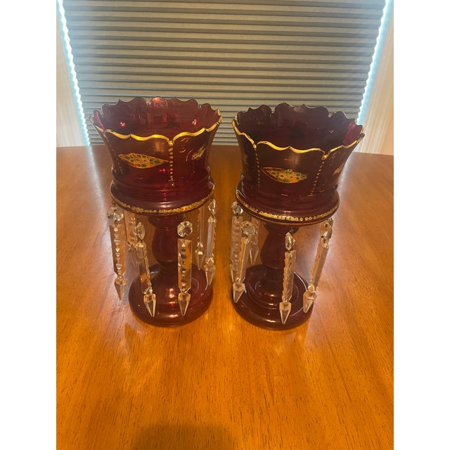 Add timeless sparkle and elegance to your mantel, sideboard, or console with this charming pair of ruby (cranberry) glass...