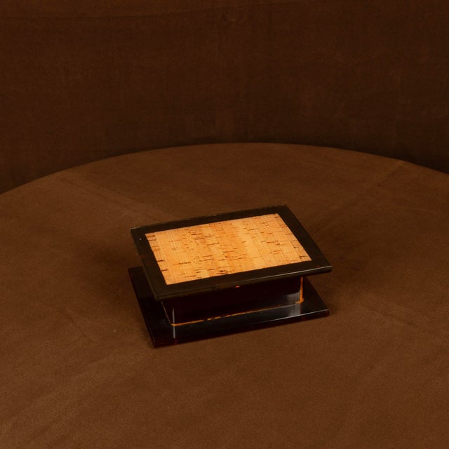 Overview An elegant rectangular jewellery box made in Italy circa 1970s, combining dark smoked acrylic glass with a...