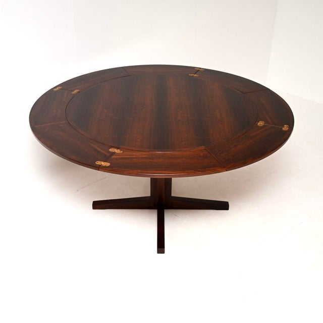 An absolutely stunning and iconic Danish vintage Flip Flap Lotus dining table by Dyrlund. This was made in Denmark, it...