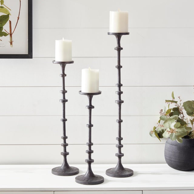 These substantial, over-scaled candleholders are great for mantle or front entry. A nod to the old way of counting, the...