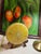 Up for consideration is a beautiful lemon lucite trivet. This would look lovely in your home and it is a great find for...
