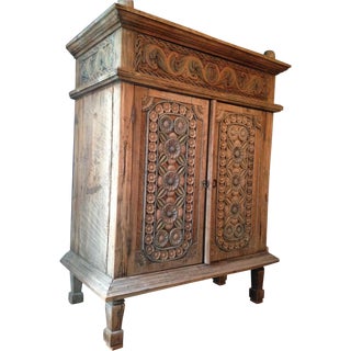 Carved Teak Indonesian Armoire For Sale