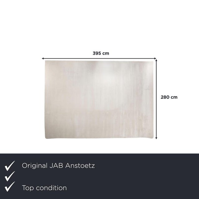 with the JAB Anstoetz Infinity, you're getting a rug that embraces simplicity. The solid beige surface is understated and...