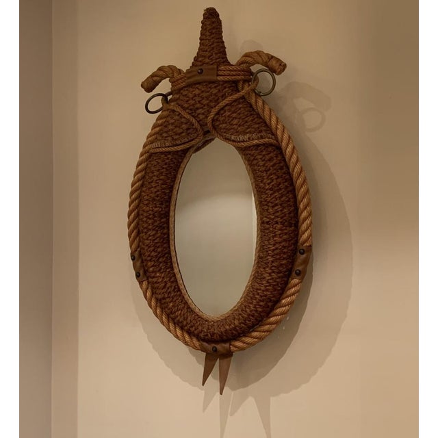 Wall Mirror attributed to Audoux Et Minet, in Flawless conditions. Designed 1960 to 1969 This piece is attributed to the...