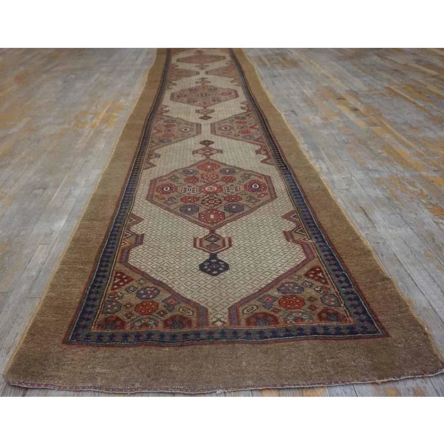 Antique Persian Serab rug, size: 3'4" x 14'6". Antique Serab Hallway Runner Wool Ivory Rug, Circa Date: 1880s. This...