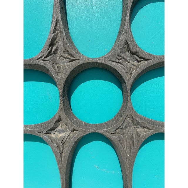 Cast aluminum brutalist door grill or wall decoration. Can be screwed to your existing door without any major construction...