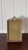 Large antique brass frame featuring an elegant bow detail and rich patina.