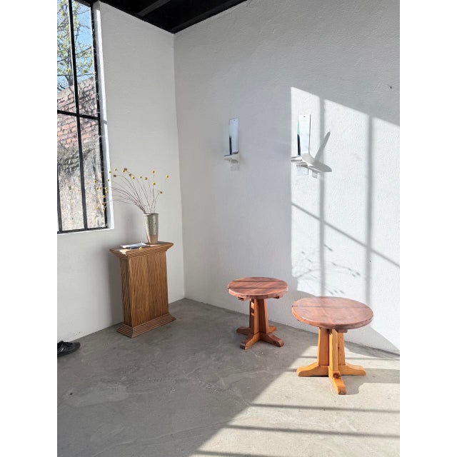 Set of two solid pine side tables or small end tables from the 1960s. We love their mountain-style look, with their simple...