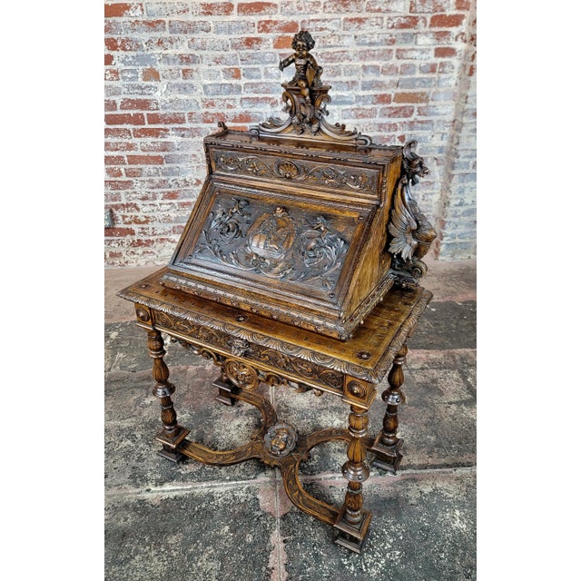 19th century Highly carved Italian Drop Leaf Desk w/ Griffin & Putti Dimensions : 53" H x 32" W x 17" D A beautiful piece...