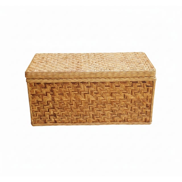 Woven wicker chest, wooden frame, and interior lined with pink floral paper, in French Provençal style. Woven leather...